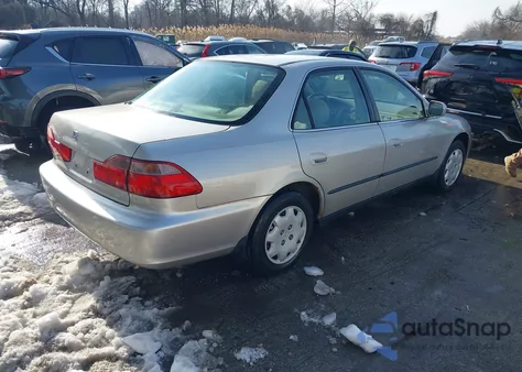 1999 Honda Accord Lx from USA, damaged, VIN 1HGCG6651XA164118